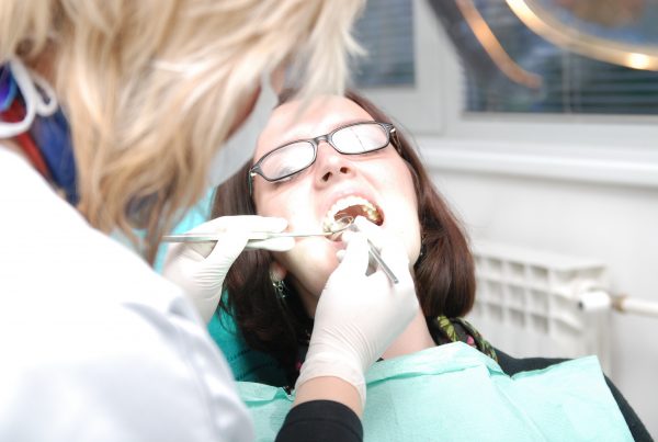 Lady At Dentist